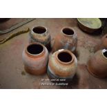 FOUR MIXED TERRACOTTA FORCERS