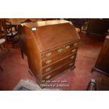 LATE GEORGIAN WALNUT BUREAU, THE FALL FLAP ENCLOSING A NICELY FITTED INTERIOR OVER TWO SHORT AND