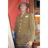 MALE MANNEQUIN WEARING GREEN ARMY UNIFORM; BLACK LEATHER BOOTS