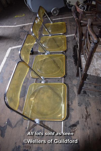 SET OF FOUR CHROME AND PLASTIC FOLDING CHAIRS