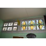 TWO SETS OF SIX MATCHING STAINED GLASS WINDOWS