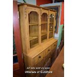 PINE GLAZED DRESSER WITH THREE GLAZED DOORS OVER THREE DRAWERS WITH CUPBOARDS BELOW, 152CM WIDE