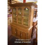 PINE DRESSER WITH GLAZED DOORS OVER TWO BLIND DRAWERS WITH CUPBOARDS BELOW, 140CM WIDE