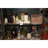 THREE SHELVES OF OLD BOTTLES, POTS AND JARS