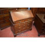 LATE 18TH CENTURY WALNUT BUREAU, THE FALL FLAP ENCLOSING PIGEONHOLES OVER TWO SHORT AND THREE LONG