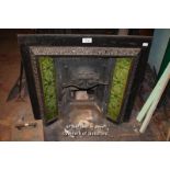 DECORATIVE CAST IRON FIRE INSERT WITH GREEN FLORAL TILES