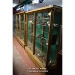 A PAIR OF OAK FRAMED DISPLAY CABINETS, OPENING FROM THE BACK, 152W X 43D X 168CM HIGH