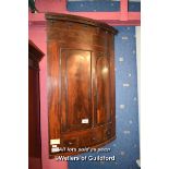 GEORGIAN MAHOGANY BOWFRONT HANGING CORNER CABINET WITH TWO DOORS, 120CM