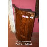 GEORGE III MINLAID MAHOGANY BOWFRONT HANGING CORNER CABINET, THE TWO DOORS ENCLOSING SHELVES,