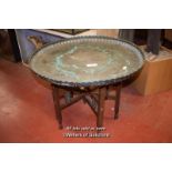 INDIAN BRASS TRAY ON FOLDING INLAID WOODEN STAND, 73CM DIAMETER