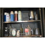 SHELF OF THERMOS FLASKS