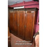 EARLY 19TH CENTURY BREAKFRONT MAHOGANY WARDROBE WITH FOUR PANELLED DOORS, THE CENTRAL ONES ENCLOSING