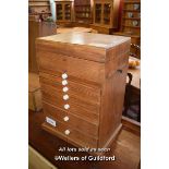 OAK COLLECTORS CABINET WITH LIFTING LID AND SEVEN GRADUATED DRAWERS, 49CM X 34CM X 24CM