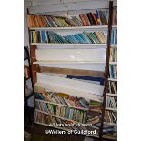 SHELVING UNIT CONTAINING A LARGE SELECTION OF MIXED PAPERBACK BOOKS