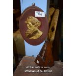 WOODEN METRONOME TOGETHER WITH A PORTRAIT WALL PLAQUE