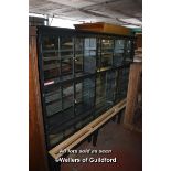 EARLY 20TH CENTURY SHOP DISPLAY CABINET WITH MANY GLAZED DOORS, 174CM X 245CM