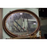 OVAL FRAMED MIRROR