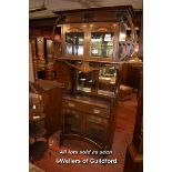 ARTS AND CRAFTS MAHOGANY BRASS INLAID DISPLAY CABINET WITH TWO GLAZED DOORS OVER OPEN SHELF WITH