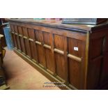 PITCH PINE SHOP COUNTER WITH PANELLED FRONT AND SHELVES TO BACK, 288CM WIDE