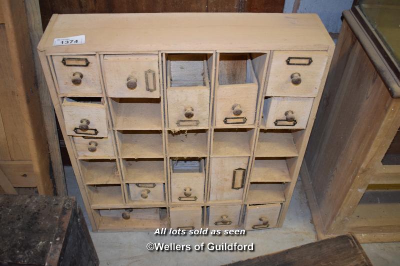 SMALL BANK OF DRAWERS