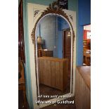 LARGE ORNATE MIRROR WITH ARCHED BEVELLED GLASS, MOULDED SURMOUNT AND BORDER, 265CM X 130CM
