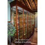 EXTREMELY LARGE MAHOGANY FRAMED SHOP DISPLAY CABINET WITH SIX FULL HEIGHT GLAZED DOORS ENCLOSING