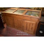 PAIR OF VICTORIAN PINE SLOPE TOP SPECIMEN DISPLAY CABINETS, EACH WITH THREE LIFTING LIDS OVER