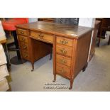 *MINIATURE PARTNERS DESK WITH NINE DRAWERS, BROWN LEATHER INSERT ON CASTOR WHEELS (A/F)