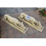 *PAIR OF COMPOSITION STONE GREYHOUNDS