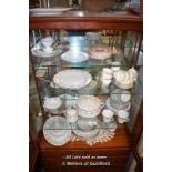 *FOUR SHELVES OF MIXED PORCELAIN INCLUDING A COMPLETE TEASET