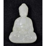 A small hardstone carving of Buddha, 6cm.