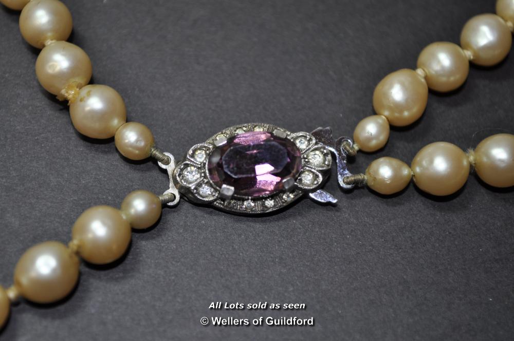 Double strand of simulated pearls, silver clasp inset with purple paste, stamped 'silver, Lotus', - Image 3 of 10