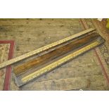 *Surveyor's brass mounted three section extendable measuring staff in pine box; another similar