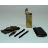 Dunhill cigarette lighter in soft leather case; Dunhill pocket cheroot holder with 9ct gold