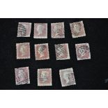 Twelve penny red stamps.