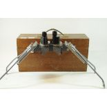 *Casella, London binocular instrument in fitted mahogany case.