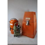*Wild, Heerbrugg, theodolite in orange case with further reinforced plastic carrying case.