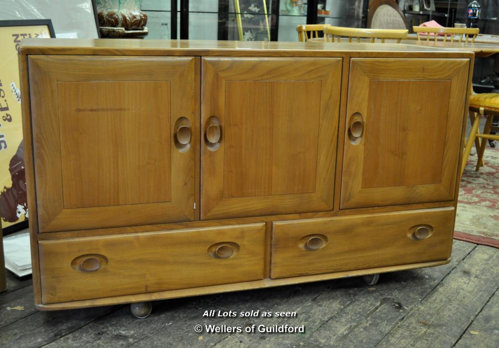 *An Ercol sideboard, 129cm wide.