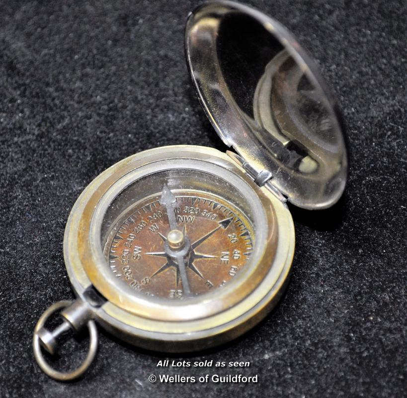 A small pocket compass marked Stanley, London