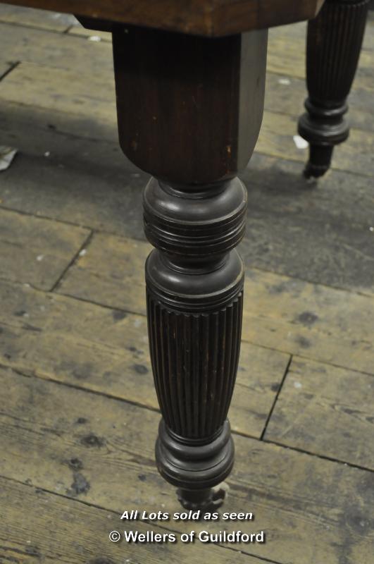 An Edwardian walnut extending dining table with canted corners, one extra leaf and winding handle, - Image 4 of 4