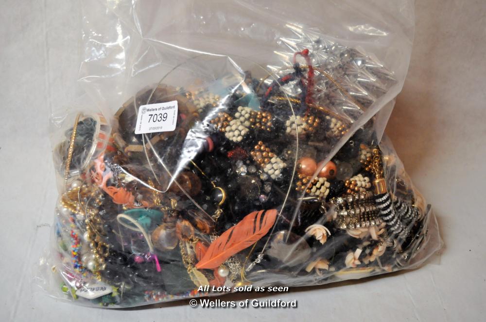 A quantity of costume jewellery is sealed bag.