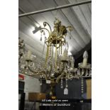 A gilt metal six light chandelier hung with prism drops, approx 65cm.