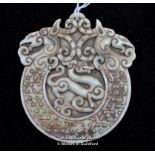 Large Chinese hardstone pendant carved as twwo dragons, 9cm¦++The top has a slice chip out of the