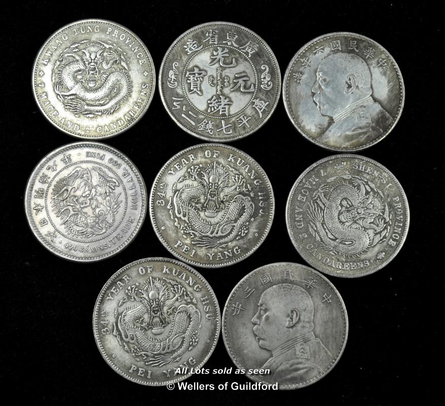 Eight Chinese coins.