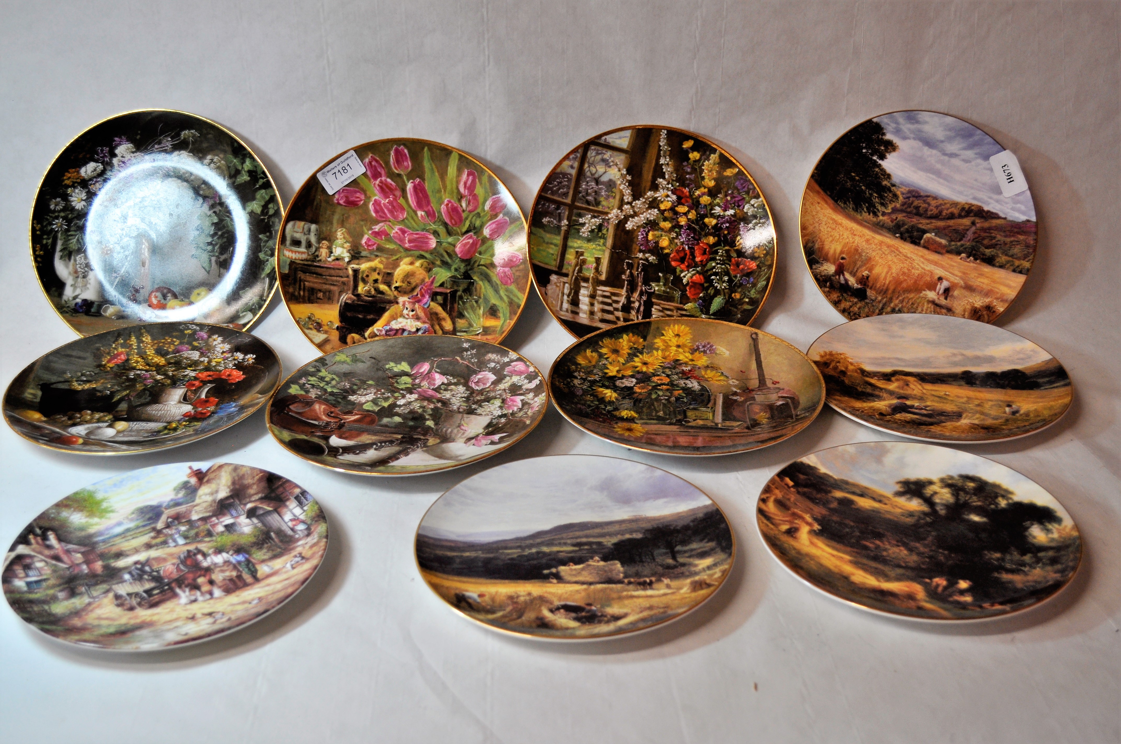 Eleven collector~s plates by Royal Doulton and others.