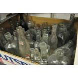 A quantity of old bottles inclding medicine and lemonade, approx 70 in total.