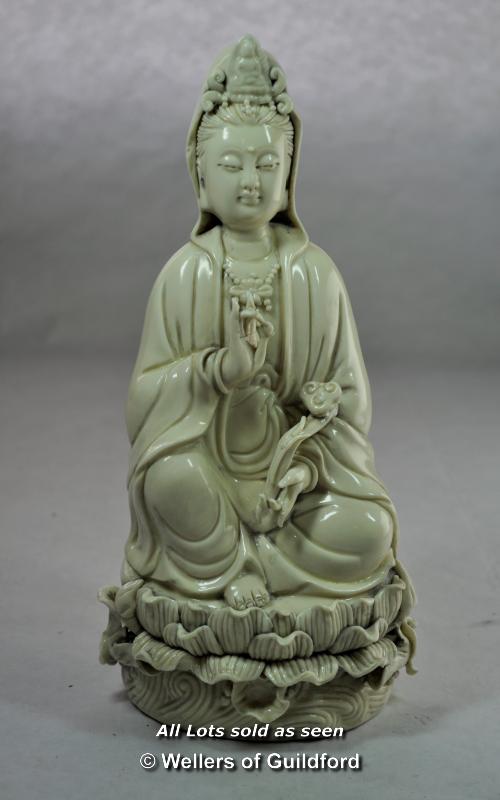 Chinese blanc de chine figure of a goddess seated on a lotus flower, impressed mark on back, 27cm.