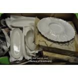 Mixed dinnerware including serving dishes and plates