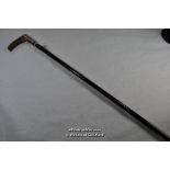 Edwardian ebony walking cane with stag antler handle, silver collar marked London 1914.