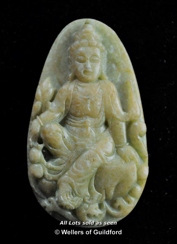 A Chinese green jade penadant carved with a buddha,7cm.